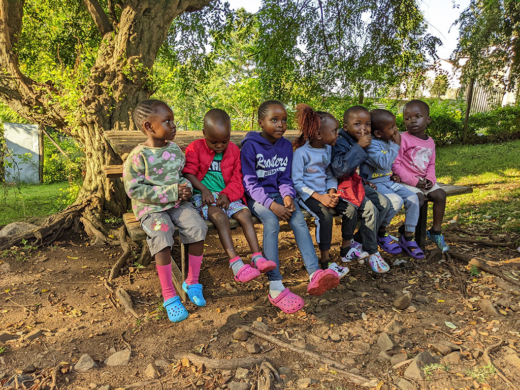 Kenyan Kids on a bench